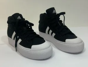 Adidas Women’s 6.5 Eco-Friendly Black and white sneakers thumbnail 1