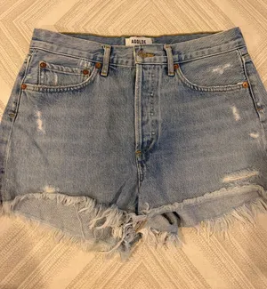 AGOLDE Light Wash Frayed Hem Distressed Denim Shorts Women’s Size 27 thumbnail 1