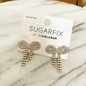BaubleBar Sugarfix by Earrings Crystal Gold Toned Bow Glam Barbiecore thumbnail 1