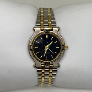 Vintage women’s watch silver gold tone black dial quartz analog 25mm running thumbnail 1