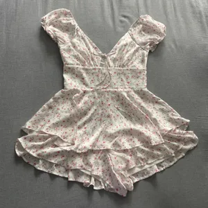 Altar’d State Floral Mini Romper thumbnail 1