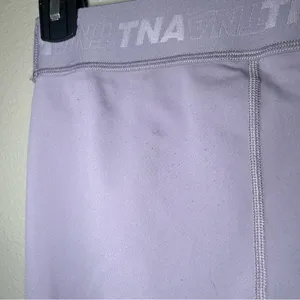 Aritzia TNA Purple Logo Mid Rise 7/8 Leggings Women’s Size Small thumbnail 9
