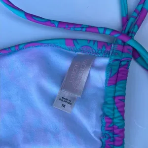 NWOT Victoria’s Secret Teal Hawaiian Purple Tropical Strappy Halter Bikini Top M thumbnail 8