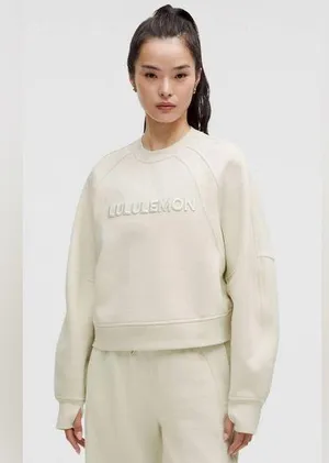 Lululemon NWT Scuba Oversized Pullover Wordmark Crewneck Bone Color Size M L thumbnail 1