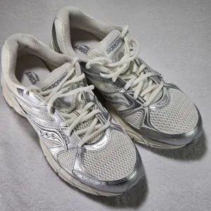 Saucony Ride Millennium Silver Cream Metallic Sneakers Women’s 10 NWOT thumbnail 1