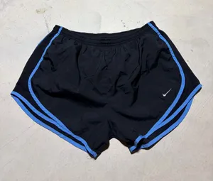 Nike women’s Black Running Shorts with Blue Trim medium thumbnail 1