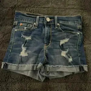 Levi’s high-rise distressed shorts thumbnail 1