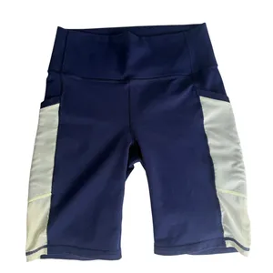 Fabletics S-M On-The-Go High-Waisted 9'' Short Navy/Creme thumbnail 1