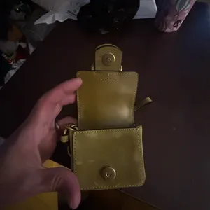 Tory Burch Sawyer mini bag key fob in suede with an oversized buckle and wristle thumbnail 6
