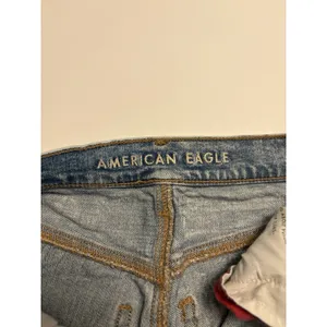 American Eagle Outfitters Distressed Light Wash Jeans Plaid Patch Detail Size 4 thumbnail 6