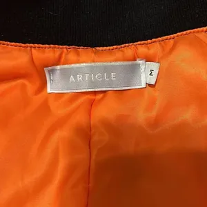 Article size M black with orange lining zip front bomber jacket EUC Size M thumbnail 4