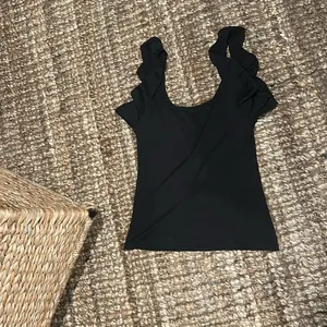 Intimately Free People Black Ruffle Hem Tank thumbnail 8
