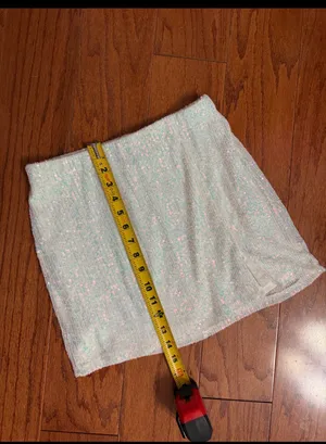 Art Class sequence white Iridescent mini skirt - size Large. ***Refer to measurements. Beautiful skirt to wear out on a party trip. Fun & spunky. Measurements approximately 13” waste x 14” long. Non- smoking home. priced to sell at as is condition. Don’t like my price, make reasonable offer! And thank you for checking my closet. thumbnail 6