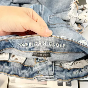 American Eagle Mid Rise Festival Flare Raw Hem Jeans Blue 0 thumbnail 3