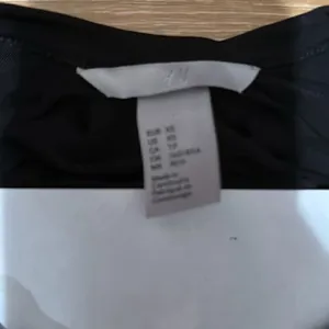 H&M black high‎ neck key hole blouse size xs thumbnail 2