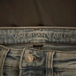 American eagle AE stretch mom jeans light wash blue ripped distressed size 4R thumbnail 7