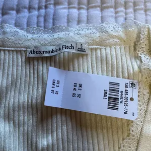 Abercrombie & Fitch lace panel detail ribbed cardigan in cream thumbnail 6