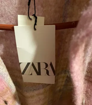 ZARA pink plaid wool-blend shacket with soft brushed texture. Lightweight outer layer styled with front flap pockets and a relaxed collar. Versatile layering piece that adds a feminine pop of pink to outfits. thumbnail 8