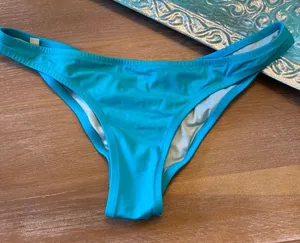 Victoria’s Secret turquoise bathing suit bottoms thumbnail 1