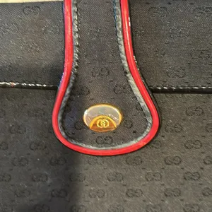 Gucci vintage crossbody bag black with red trim. Beautiful inside has wear shown thumbnail 2