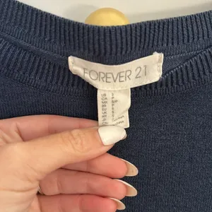 Blue Forever 21 sweater. Small discoloration at neckline thumbnail 3
