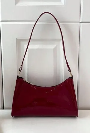 burgundy shoulder bag with gold zipper thumbnail 1