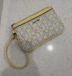 Women’s Calvin Klein Pastel Yellow Cream Wristlet Wallet EUC thumbnail 1