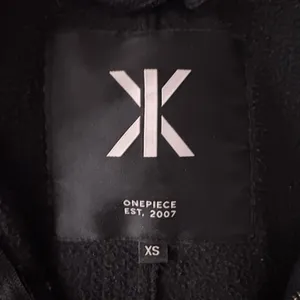 Onepiece Black Hooded Jumpsuit with Logo Patch‎ Size XS EUC thumbnail 5