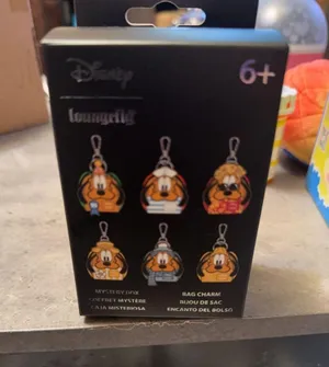 Loungefly Disney Pluto 95th Anniversary mystery bag charm. thumbnail 1