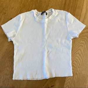 Brandy Melville Raw Hem Short Sleeve Tee in White thumbnail 1