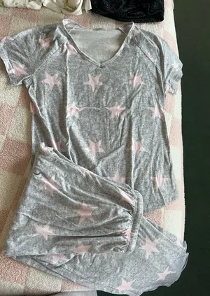 Amazon Soft gray pajama set with pink star pattern. Short-sleeve top and matching shorts. Comfortable and stylish. thumbnail 1