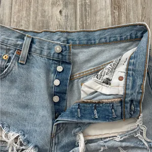 Levi's Taille Haute Line 501 High Waist Ripped Cutoff Denim Shorts Size 28 thumbnail 11