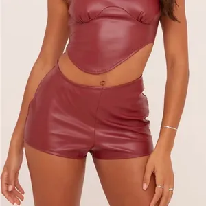 EGO Curved Waistband Shorts In Burgundy Faux Leather thumbnail 1