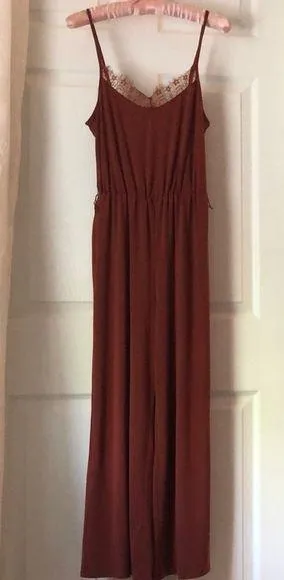 Express jumpsuit, adjustable shoulder straps, missing belt thumbnail 1