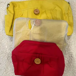 Duffle bag set. 2 med yellow (14 x 7) 1 small red interior and exterior pockets thumbnail 1