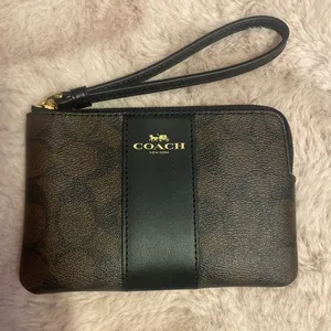 Brand new coach wristlet in black and brown thumbnail 1