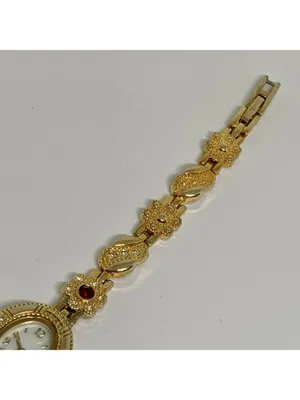 Allude gold tone women’s watch red stones 19mm floral links up to 7.5” running thumbnail 4