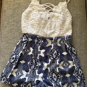 Charlotte Russe Women’s White Lace Top Navy Patterned romper thumbnail 1
