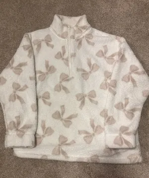 Cozy Cream Mock Neck Fleece with Bow Print thumbnail 1