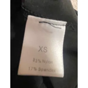 Black Athletic Exercise Dress with Built-in Romper Liner and Pockets Sleeveless‎ thumbnail 9