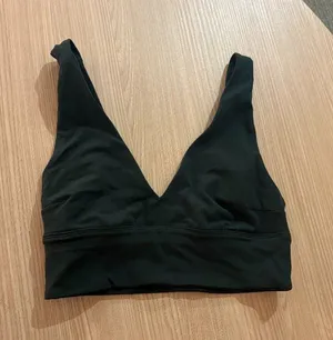 Lululemon Sports Bra Estimated Size 4 Dark Green V Neck No Pads Pull Over thumbnail 1