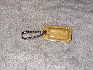 Coach tan/ yellow cream Keychain Tag thumbnail 1