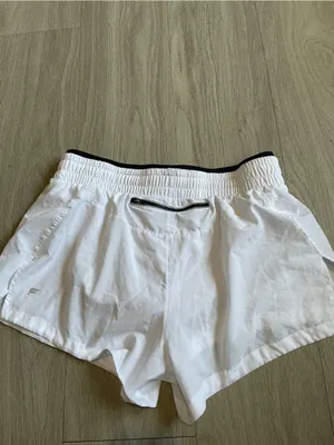 Fabletics White Athletic Shorts with Black Waist Trim thumbnail 2
