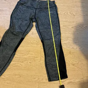 Nike Dri-FIT Capri running leggings with a black and gray geometric print and me thumbnail 7