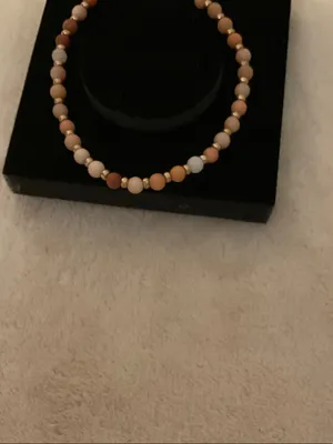 Neutral Multi-Bead Stretch Bracelet with Gold Cross Charm thumbnail 4