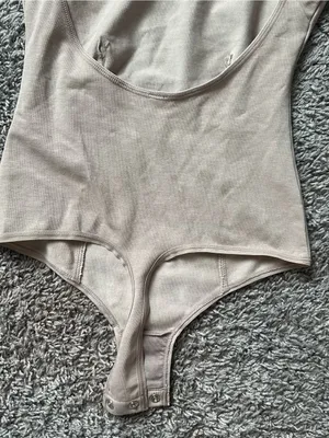SKIMS Open-Back Ribbed Bodysuit in Beige Taupe thumbnail 3