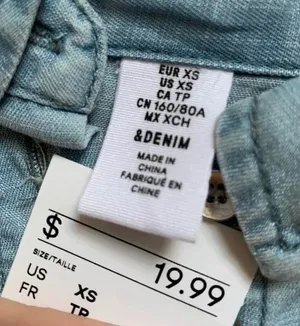 H&M Light wash denim button down shirt thumbnail 4