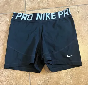 Nike Pro Black Athletic Compression Shorts with White Logo thumbnail 1