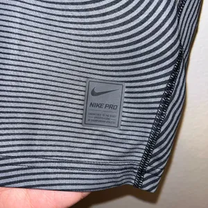 Nike Pro Black & Gray Striped Short Sleeve Training Top thumbnail 2