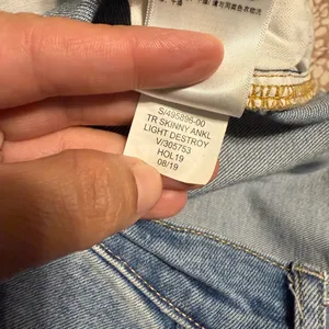 GAP “True Skinny” Distressed jeans. Size 8 has two spots in the front leg thumbnail 7